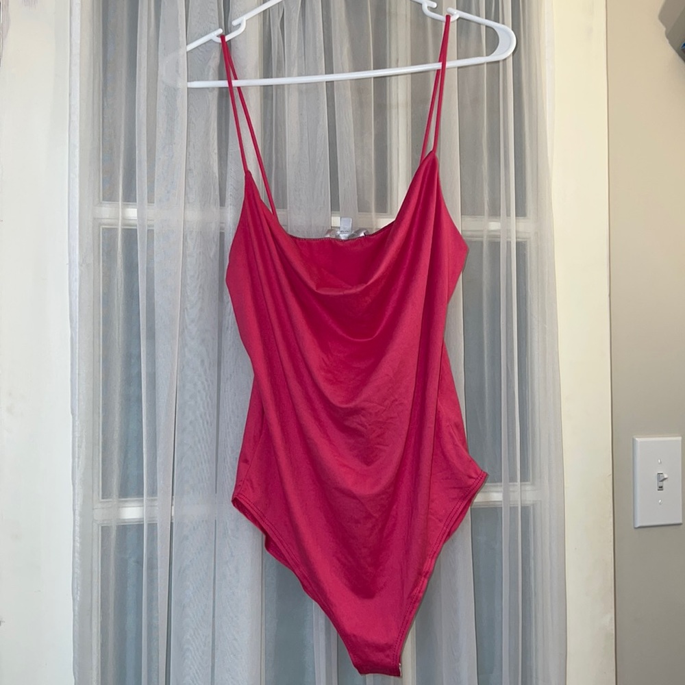 Pink body suit size MEDIUM